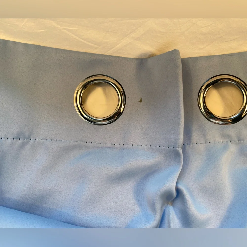 Curtain single‎ panel, light blue, silver tone grommets. 42” x 82”
